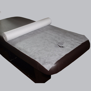 Nonwoven massage bed sheet cover roll with face hole